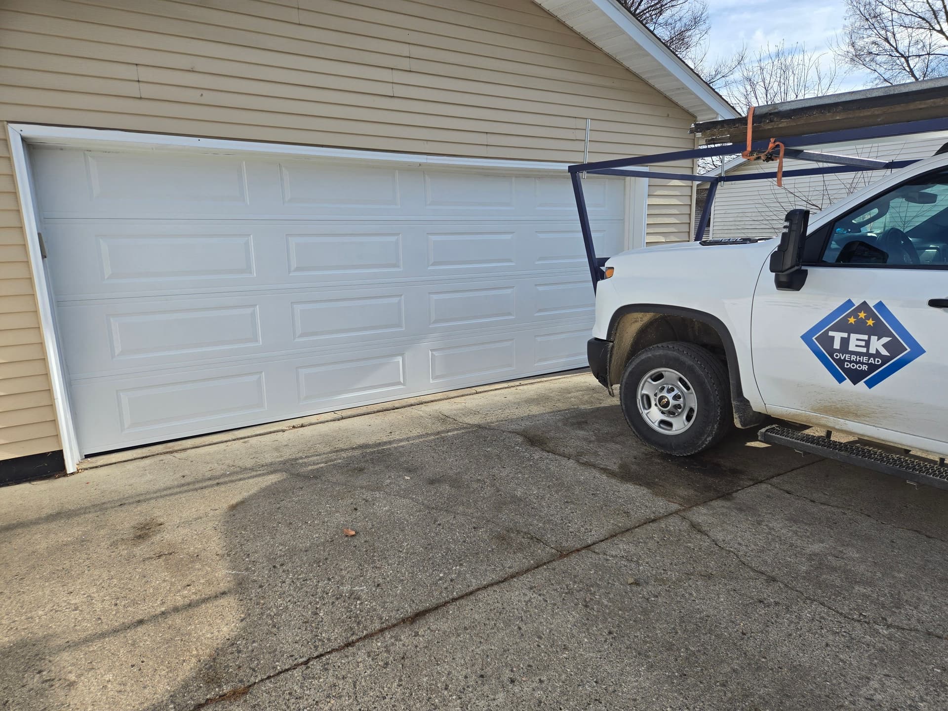 Garage Door Upgrade Featuring New Steel Panels image