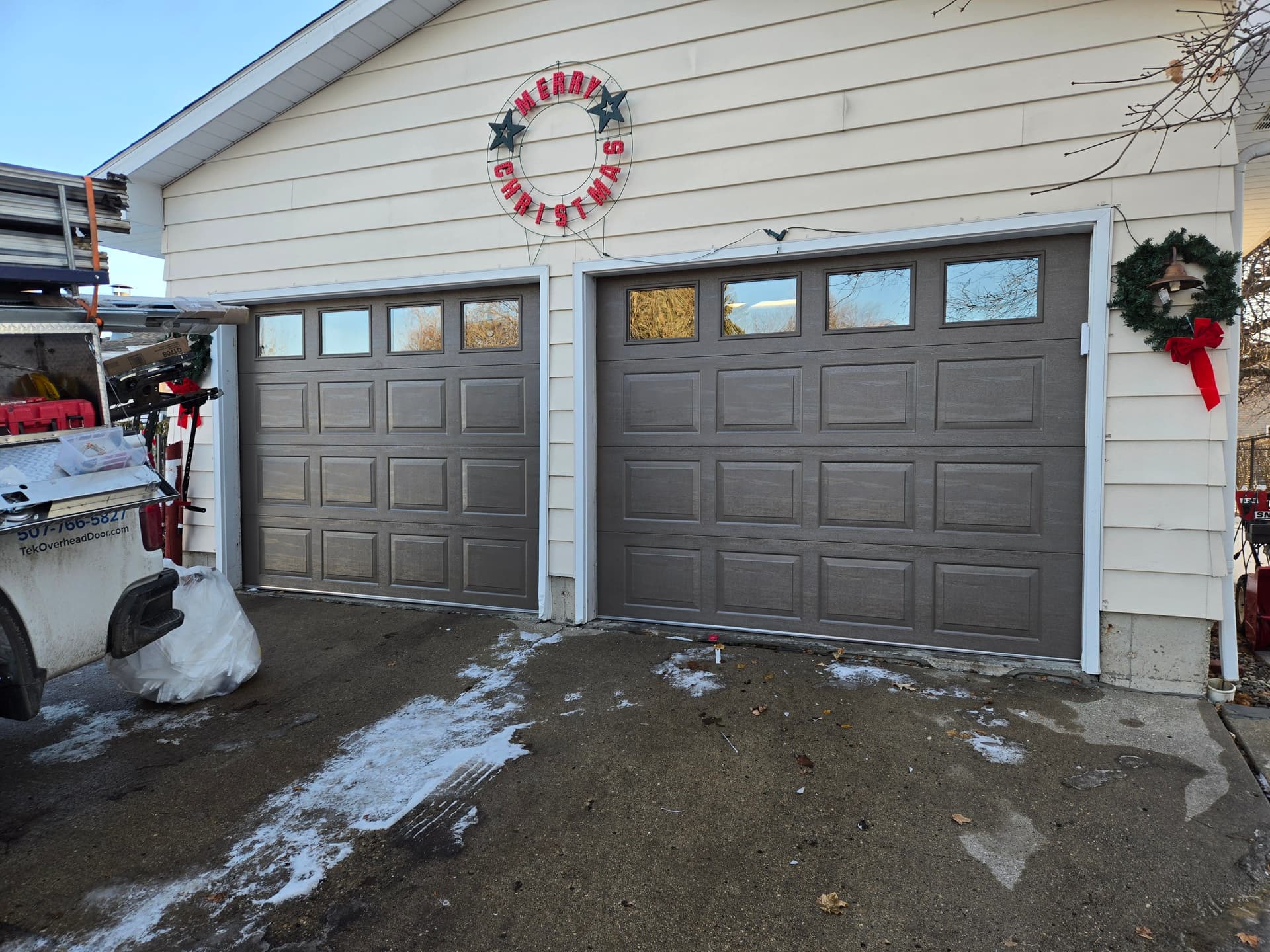 Bronze Garage Doors with Windows by Tek Overhead Door LLC image