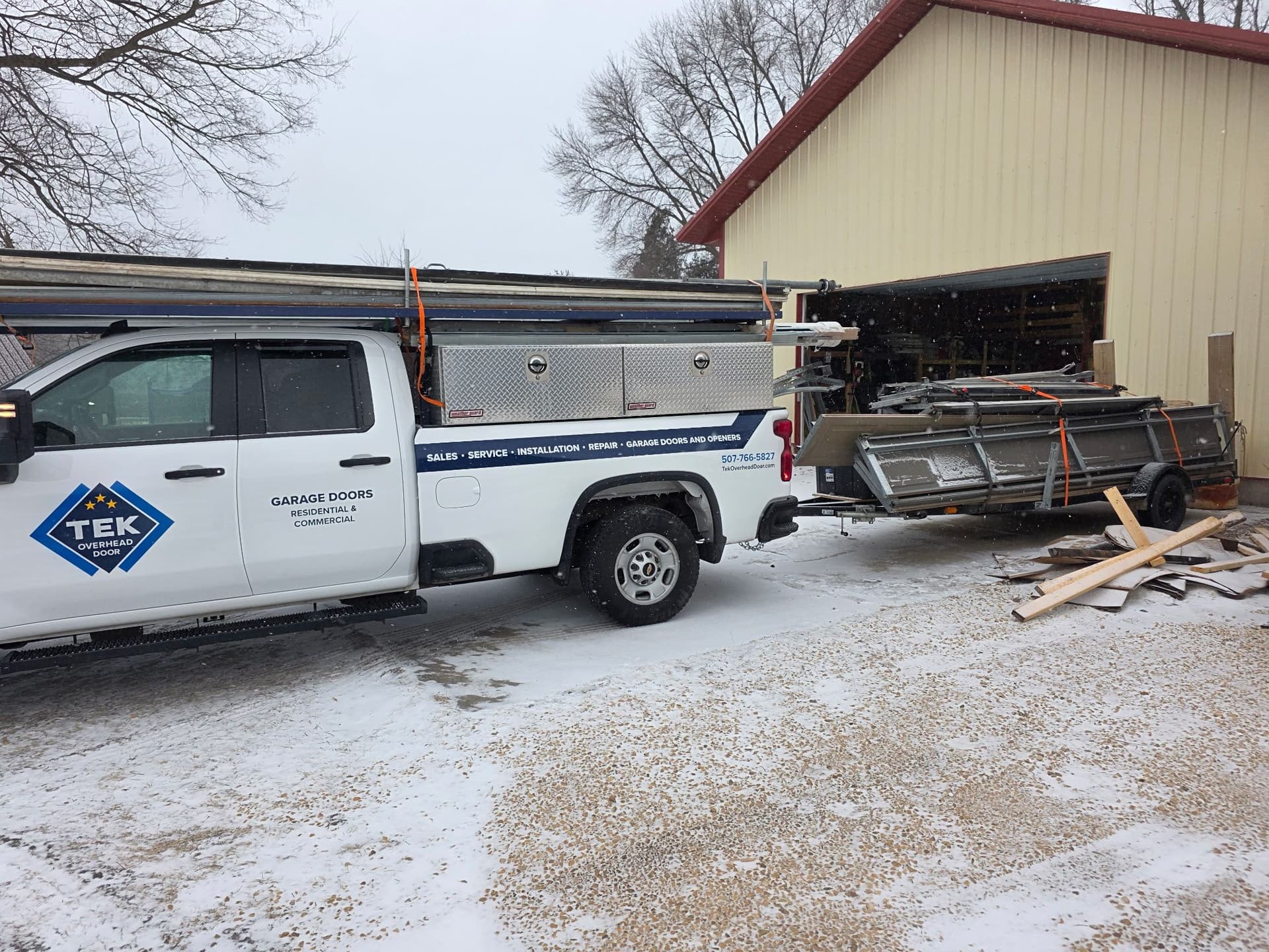 Tek Overhead Door LLC Takes on Winter Maintenance image